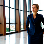 아트호텔 추천 지역 - Barcelona Art Hotel**

"A professional businesswoman, fully clothed in a modest business suit, stand...